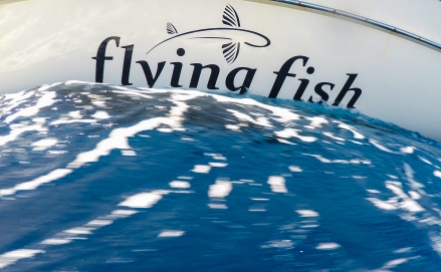 The hull of Flying Fish slices through the Pacific at at rate of 175 miles per day